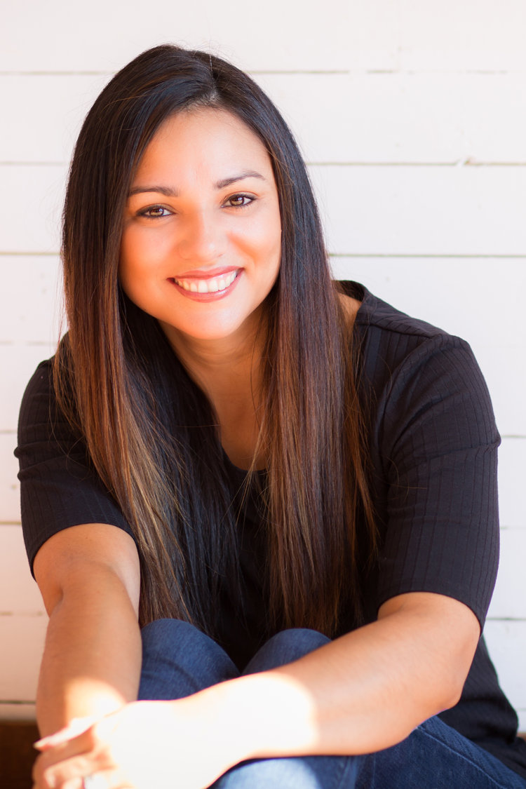 Young mom poses for photos in downtown Apex nc