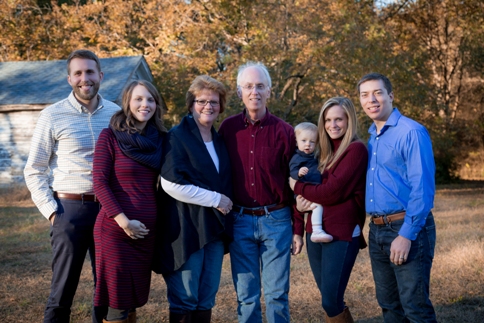 Three generations pose for a family photo in Raleigh NC