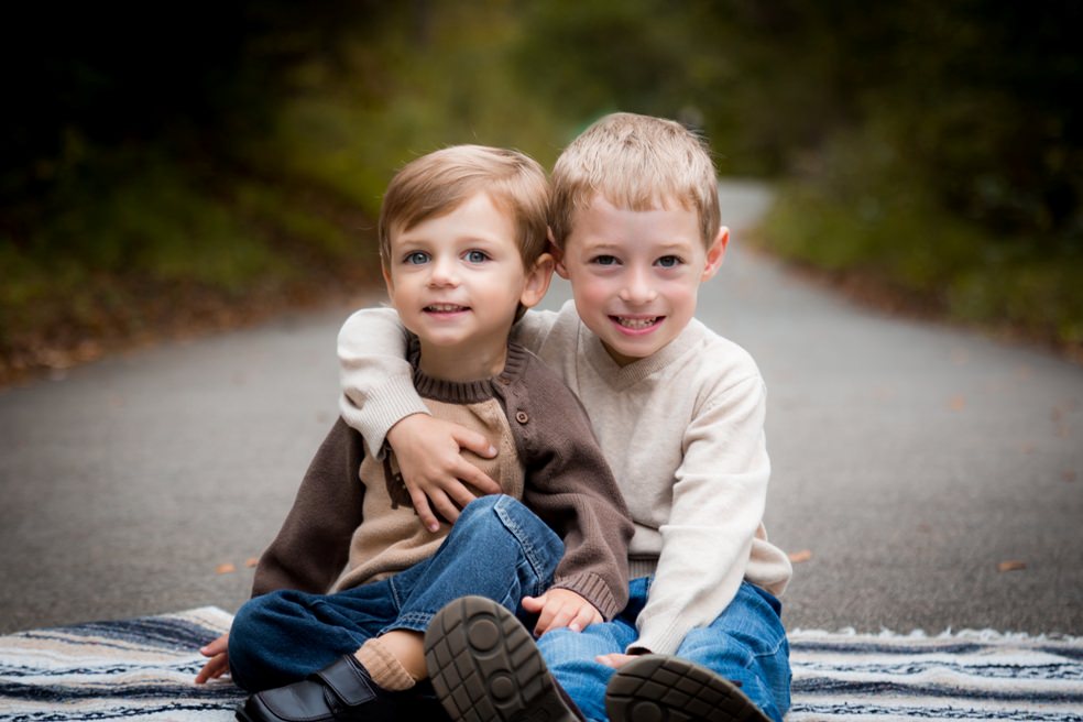 Two brothers pose for pictures at White Deer Park in Garner NC